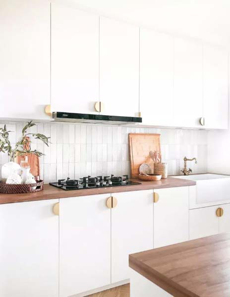  White and Gold Kitchen With Statement Hardware