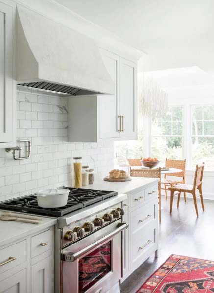 White and Gold Kitchen With Subway Tile